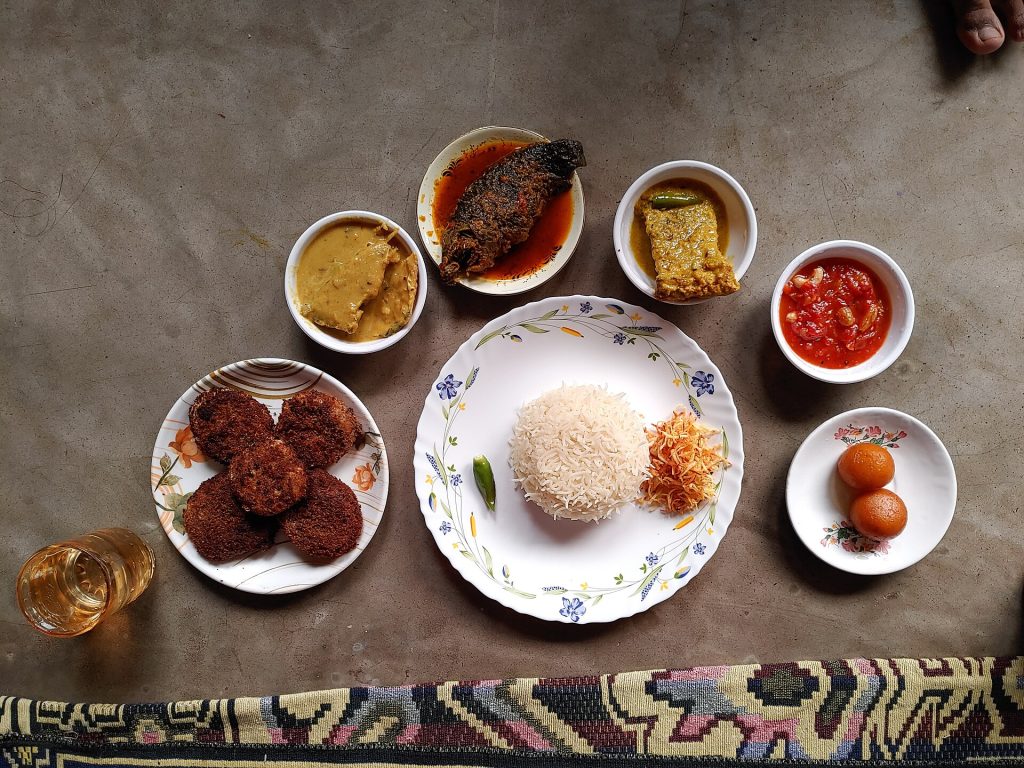 Traditional Bengali dishes served at a pre wedding feast